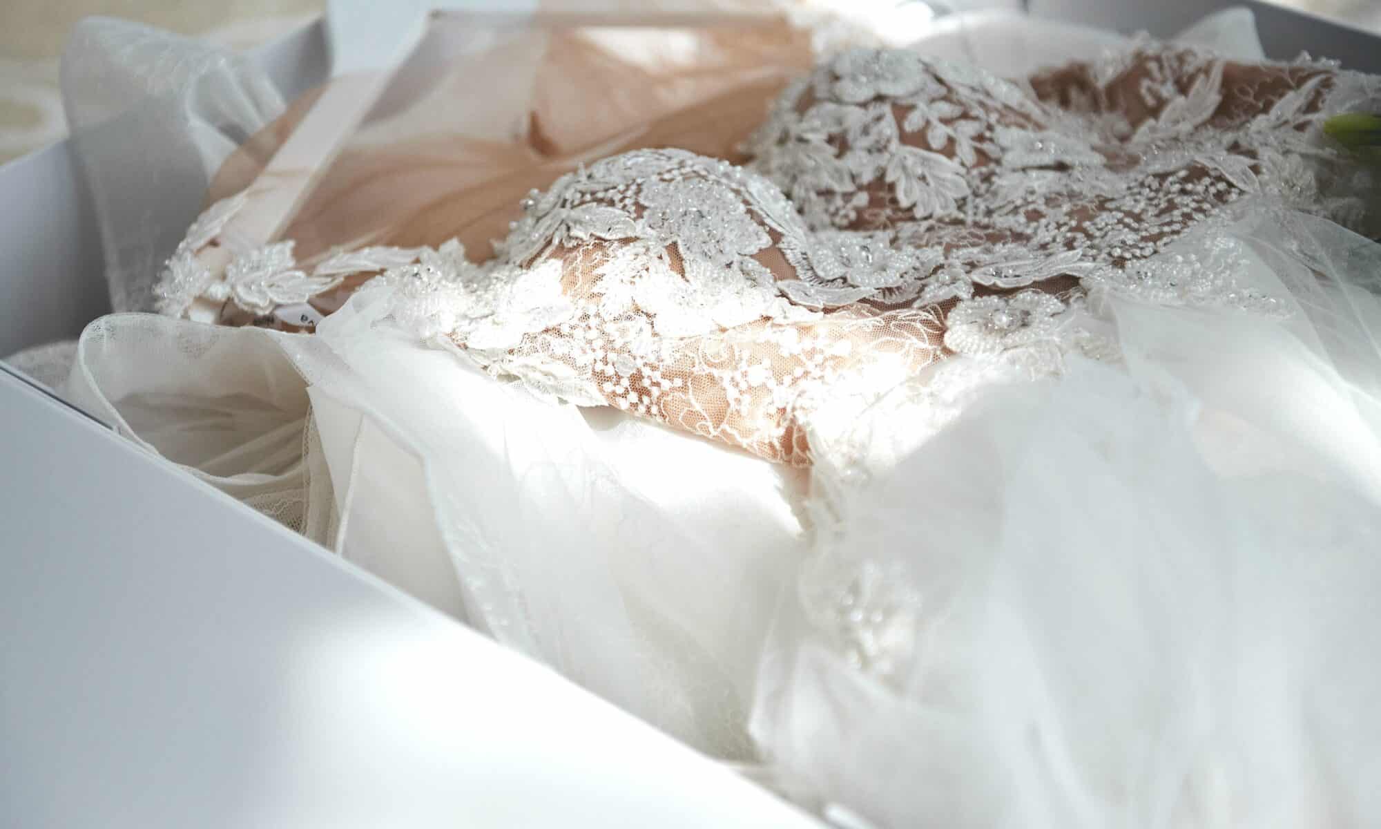 a wedding dress in a box being preserved