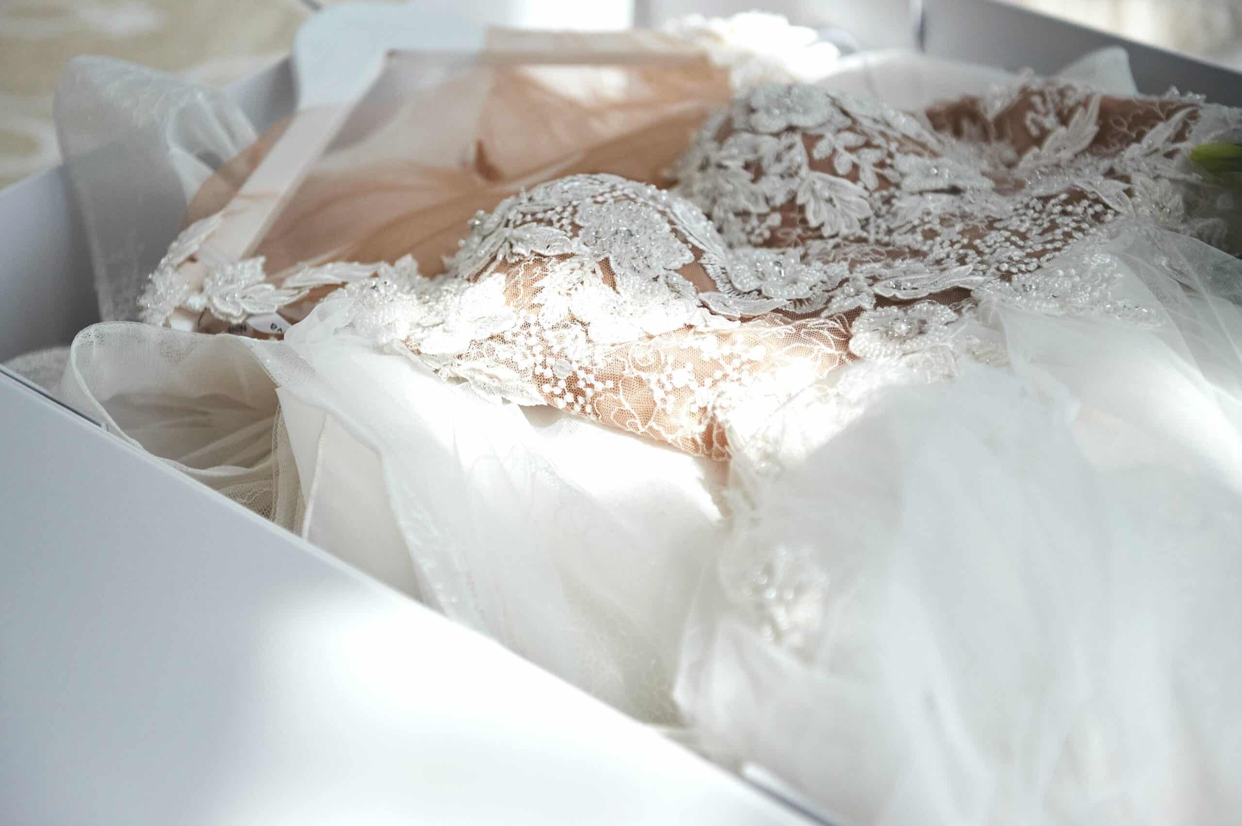 a wedding dress in a box being preserved